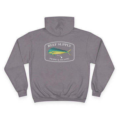 The back of a premium Champion gray pullover hoodie, crafted for those who respect the sea. It features a bold, high-definition print of a vibrant Mahi Mahi—a tribute to the thrill of the offshore hunt. Paired with 'Reef Supply' coastal branding and the iconic 'Pacific & Atlantic' call-out, this Champion-quality garment delivers the durability needed for the marina and the style of a dedicated angler