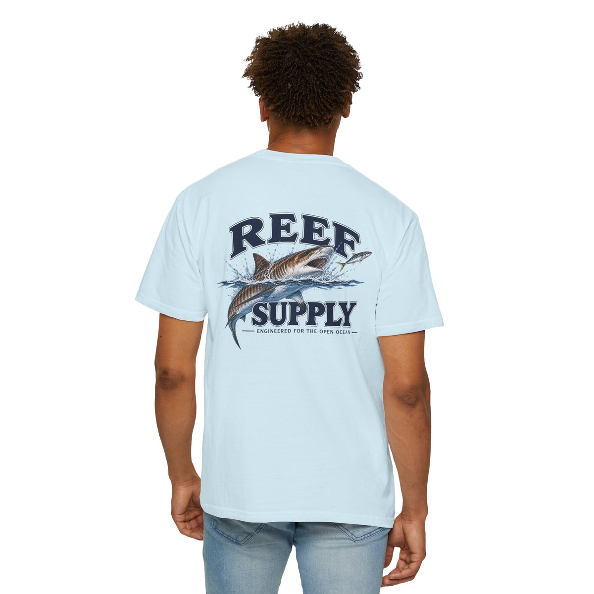 Back view of a light blue Tiger Tee featuring a shark graphic by Reef Supply