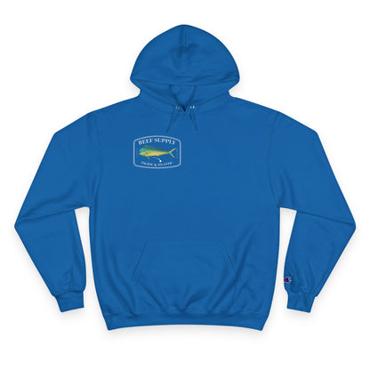The front of a premium Champion blue pullover hoodie, crafted for those who respect the sea. It features a bold, high-definition print of a vibrant Mahi Mahi—a tribute to the thrill of the offshore hunt. Paired with 'Reef Supply' coastal branding and the iconic 'Pacific & Atlantic' call-out, this Champion-quality garment delivers the durability needed for the marina and the style of a dedicated angler