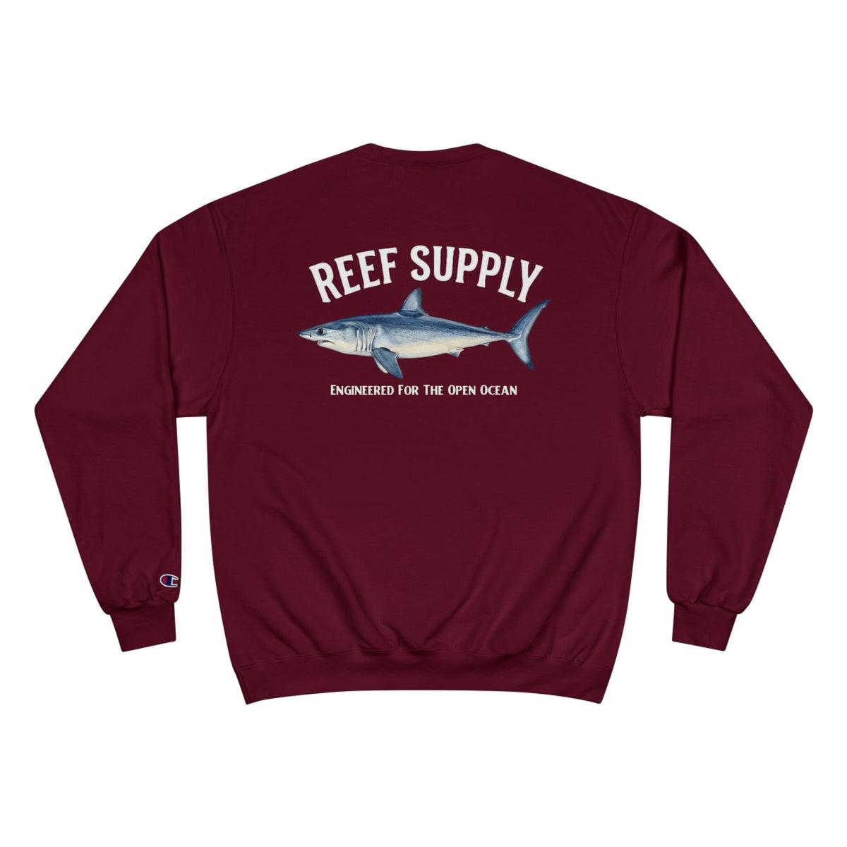 Maroon Reef Supply crewneck sweatshirt featuring a Mako shark illustration and text.