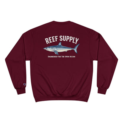 Maroon Reef Supply crewneck sweatshirt featuring a Mako shark illustration and text.