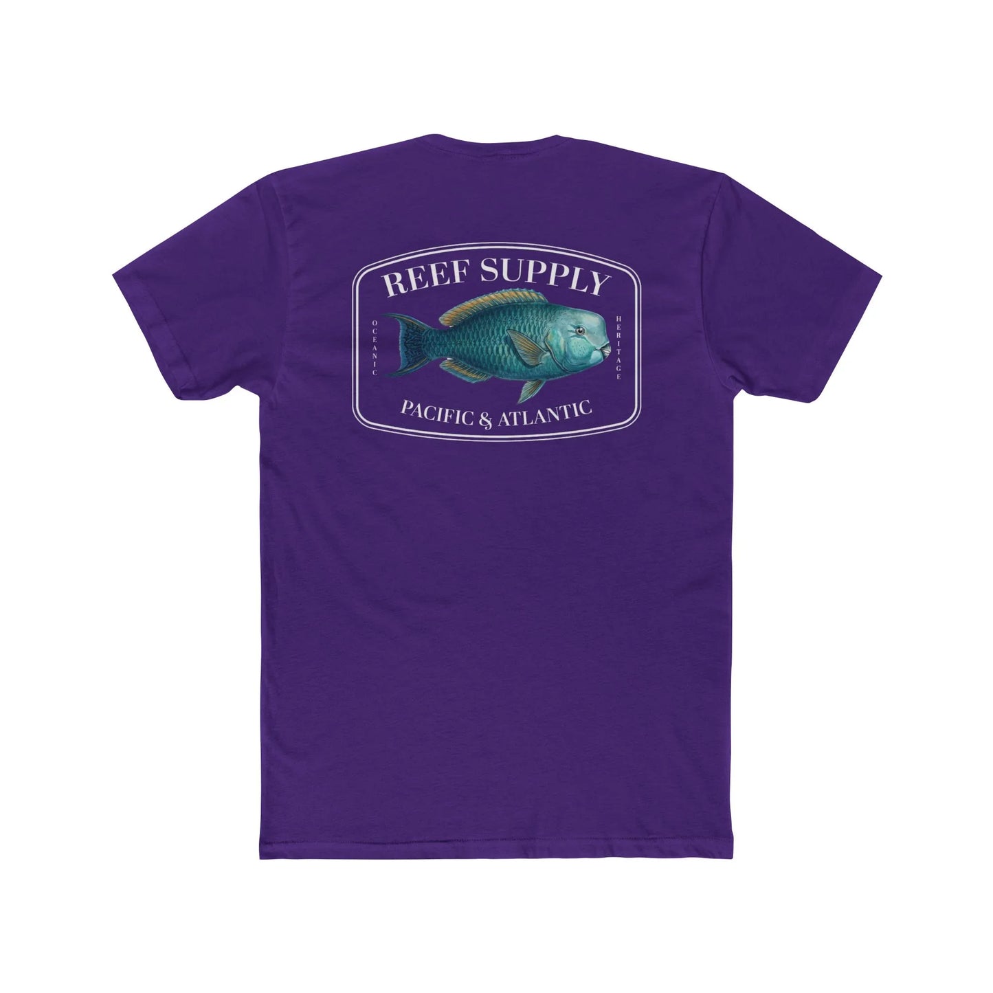 A close-up view of the back of a purple premium cotton t-shirt. The centerpiece is a detailed, vibrant illustration of a blue Parrotfish, reflecting its natural colors. The Reef Supply brand logo is arched over the top of the fish, with 'Pacific & Atlantic' text printed in a clean font beneath it, highlighting our coastal inspiration