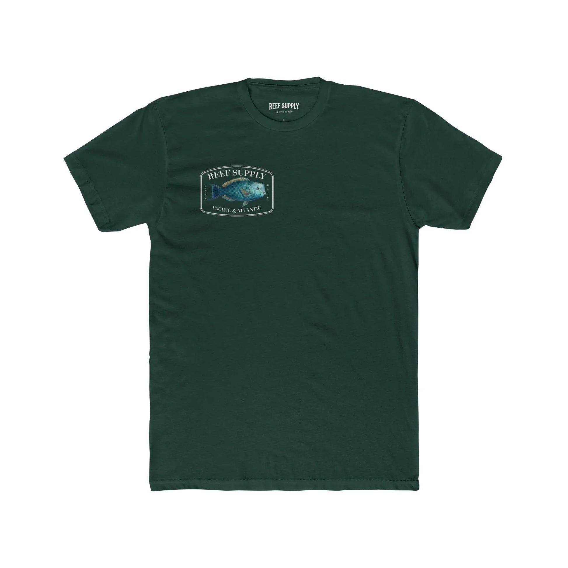 A close-up view of the front of a forest green premium cotton t-shirt. The centerpiece is a detailed, vibrant illustration of a blue Parrotfish, reflecting its natural colors. The Reef Supply brand logo is arched over the top of the fish, with 'Pacific & Atlantic' text printed in a clean font beneath it, highlighting our coastal inspiration
