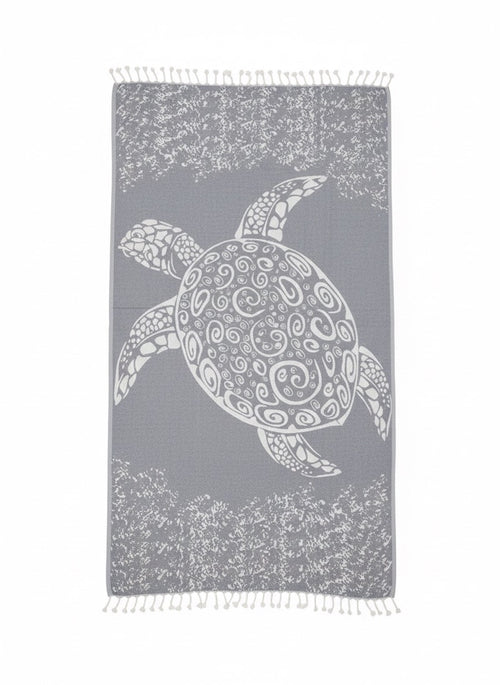 Towel with a turtle design on a gray background