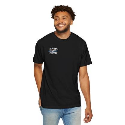 Man wearing a black Reef Supply Tiger Tee with a graphic logo on the chest.