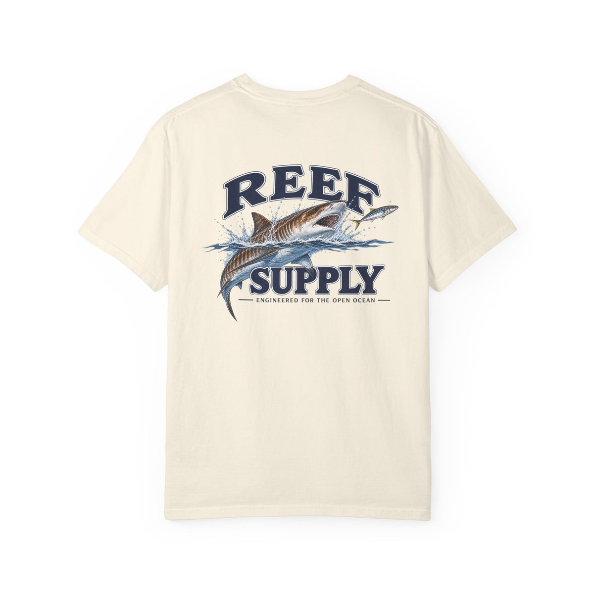 Back of a cream Reef Supply Tiger Tee featuring a graphic of a shark jumping from the ocean.