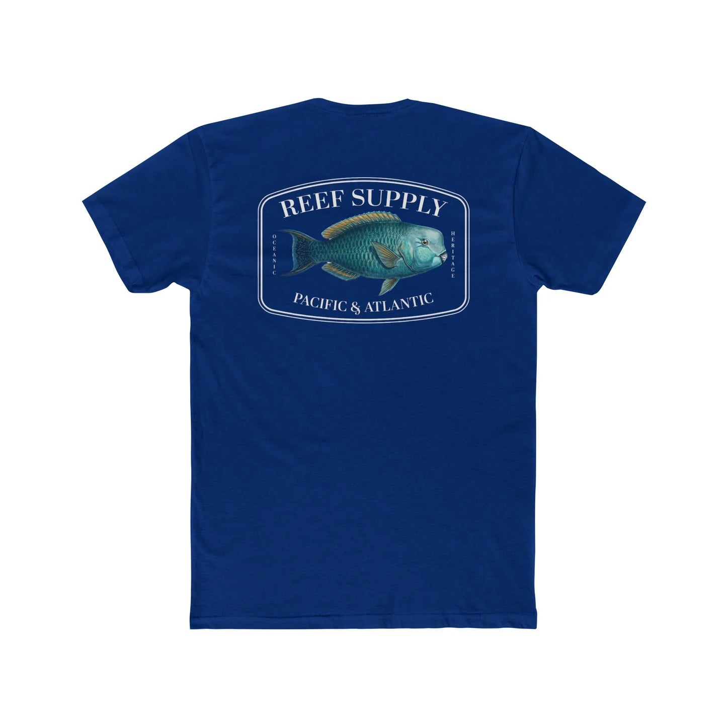 A close-up view of the back of a dark blue premium cotton t-shirt. The centerpiece is a detailed, vibrant illustration of a blue Parrotfish, reflecting its natural colors. The Reef Supply brand logo is arched over the top of the fish, with 'Pacific & Atlantic' text printed in a clean font beneath it, highlighting our coastal inspiration