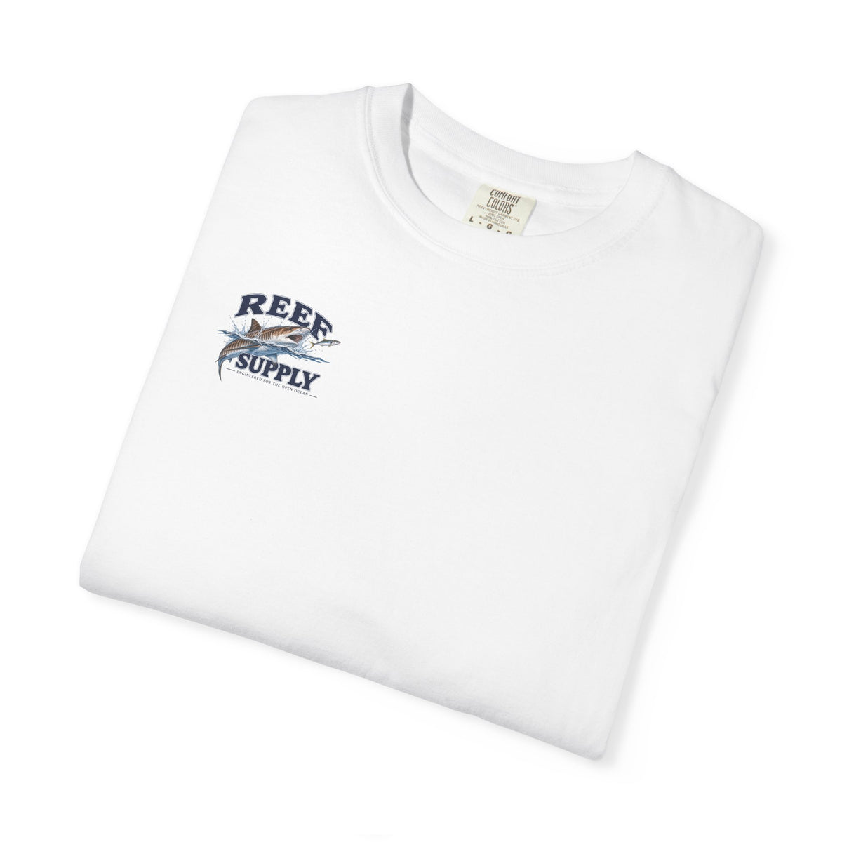 White Tiger Tee graphic t-shirt featuring a Reef Supply fish logo on a folded cotton tee.