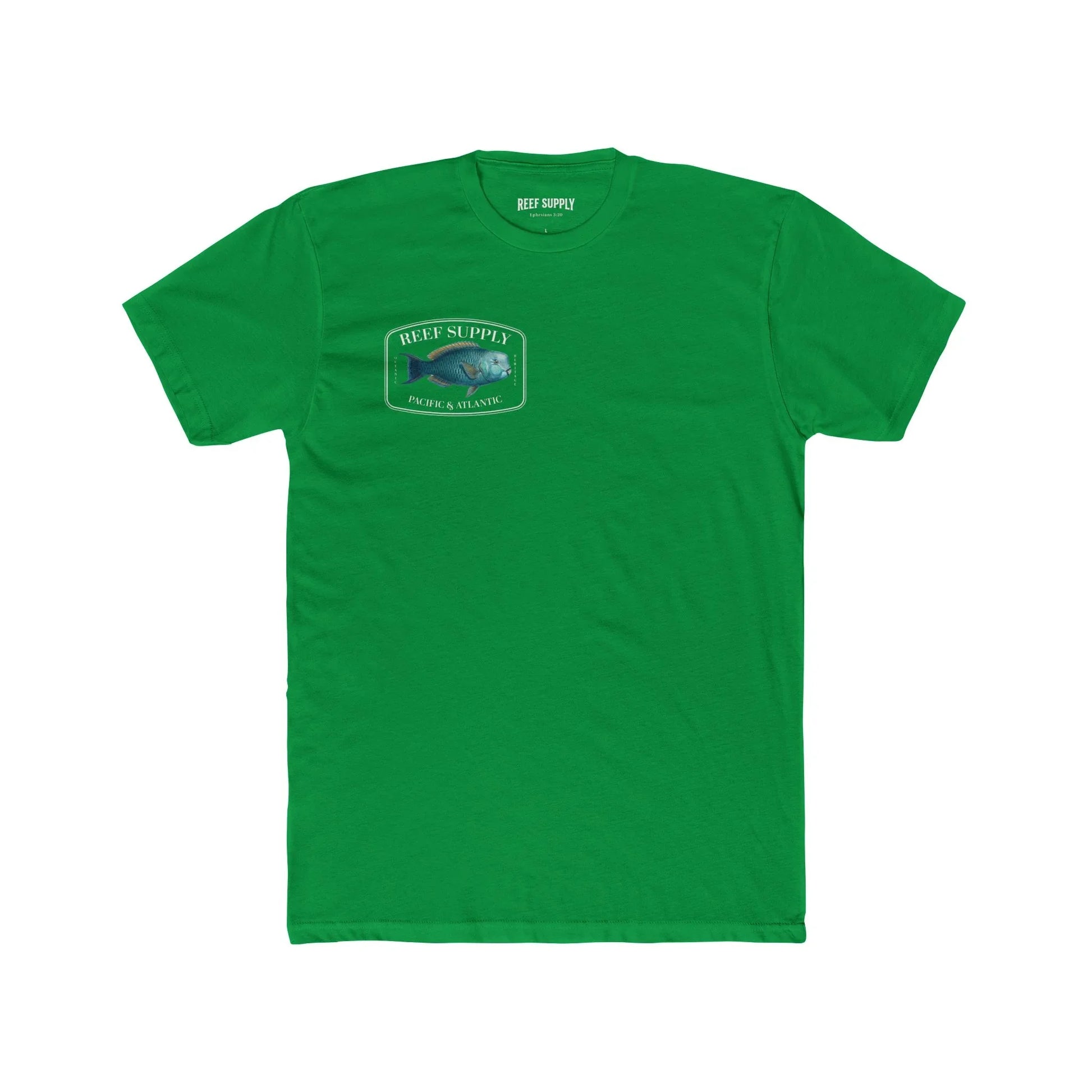 A close-up view of the front of a green premium cotton t-shirt. The centerpiece is a detailed, vibrant illustration of a blue Parrotfish, reflecting its natural colors. The Reef Supply brand logo is arched over the top of the fish, with 'Pacific & Atlantic' text printed in a clean font beneath it, highlighting our coastal inspiration