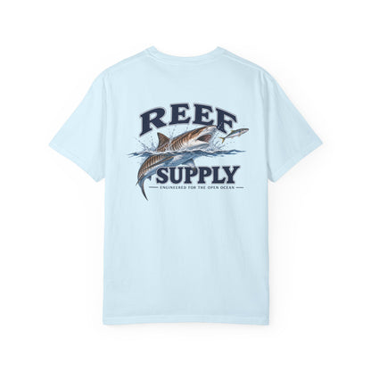 Light blue Tiger Tee featuring a shark graphic and Reef Supply logo.
