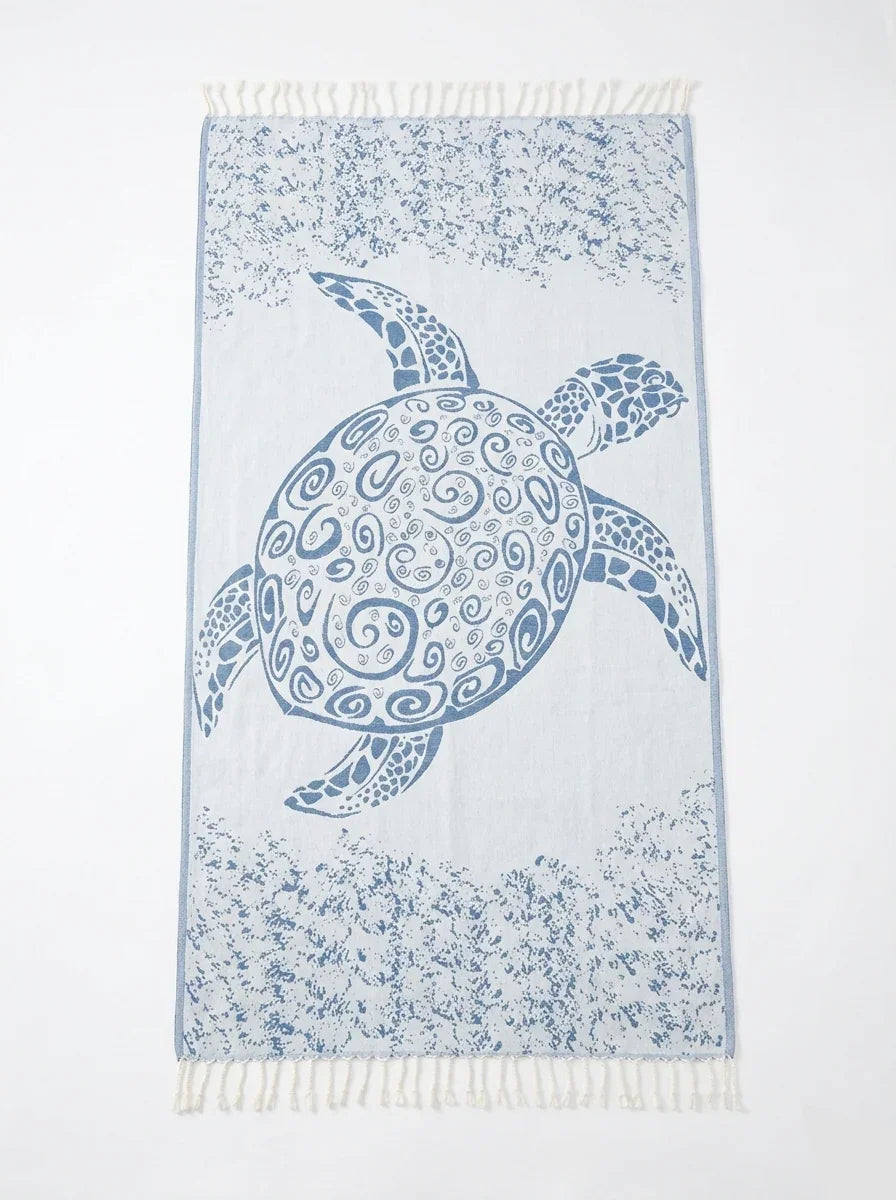 Towel with a turtle design on a white background
